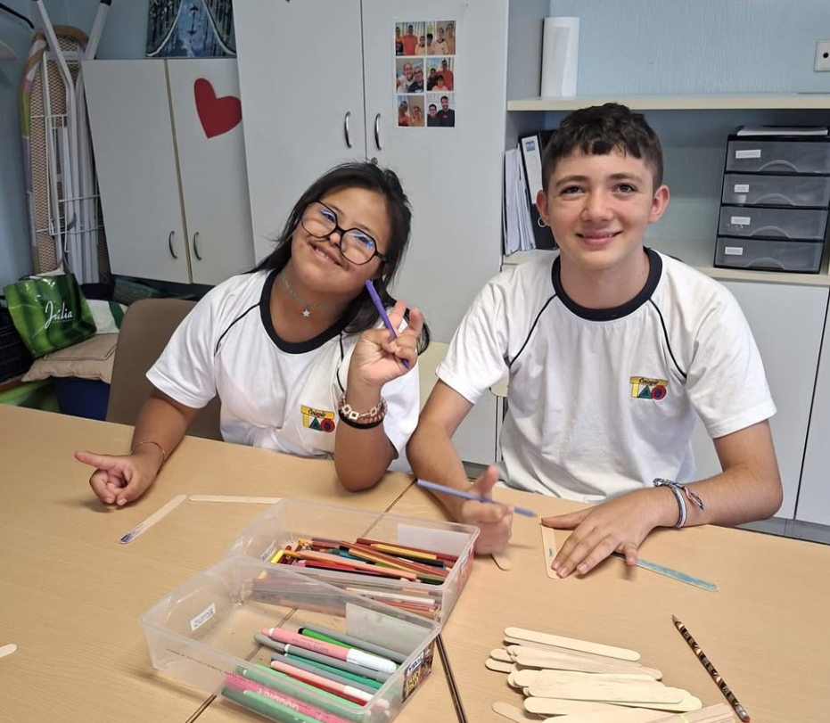 Two TAO School students working together in the classroom
